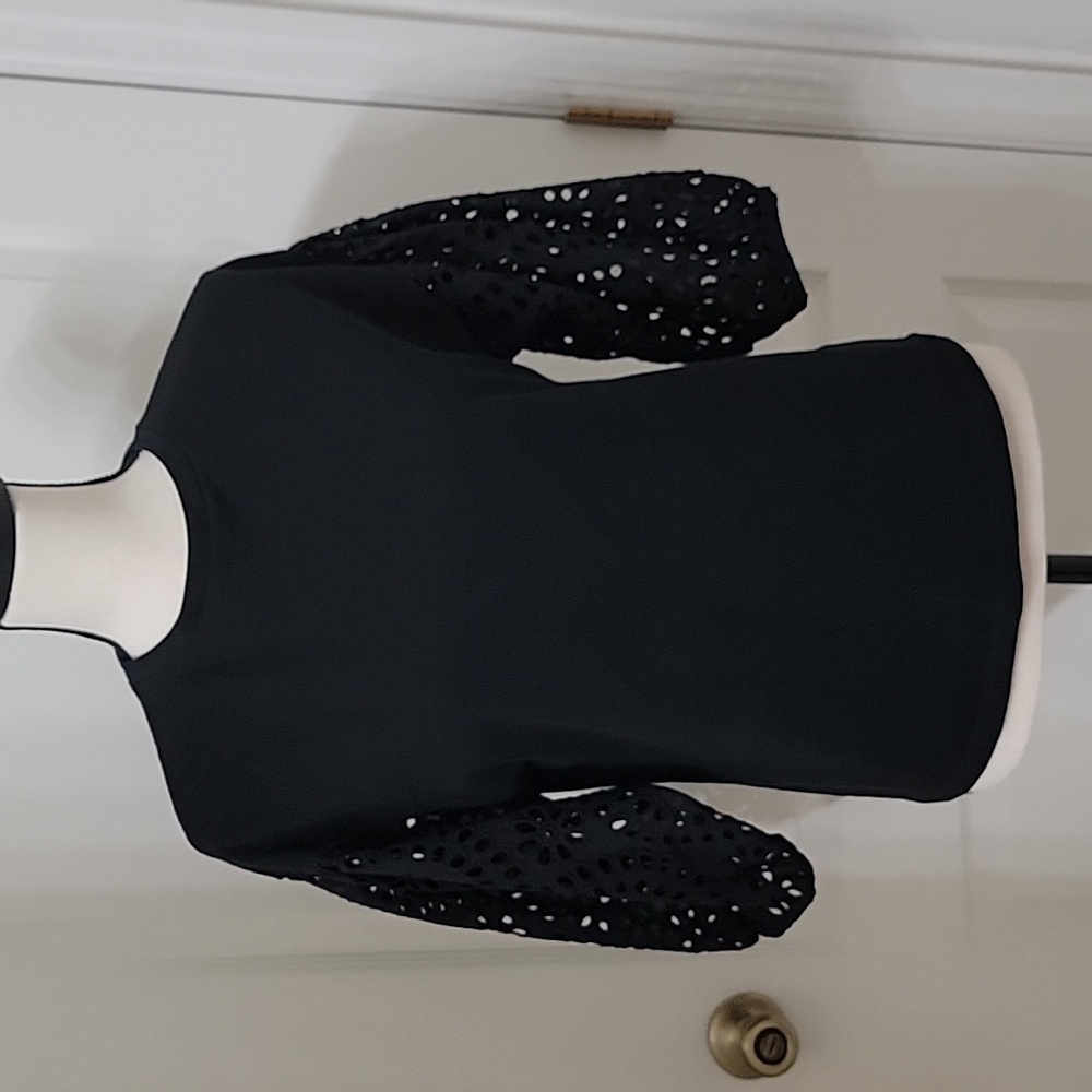a new day Size XS, Black Long Eyelet-Sleeve Top. Excellent Used Condition